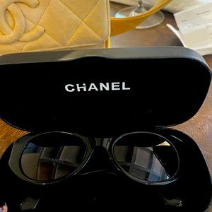 Chanel sunglasses and case. No scratches.  Like new
